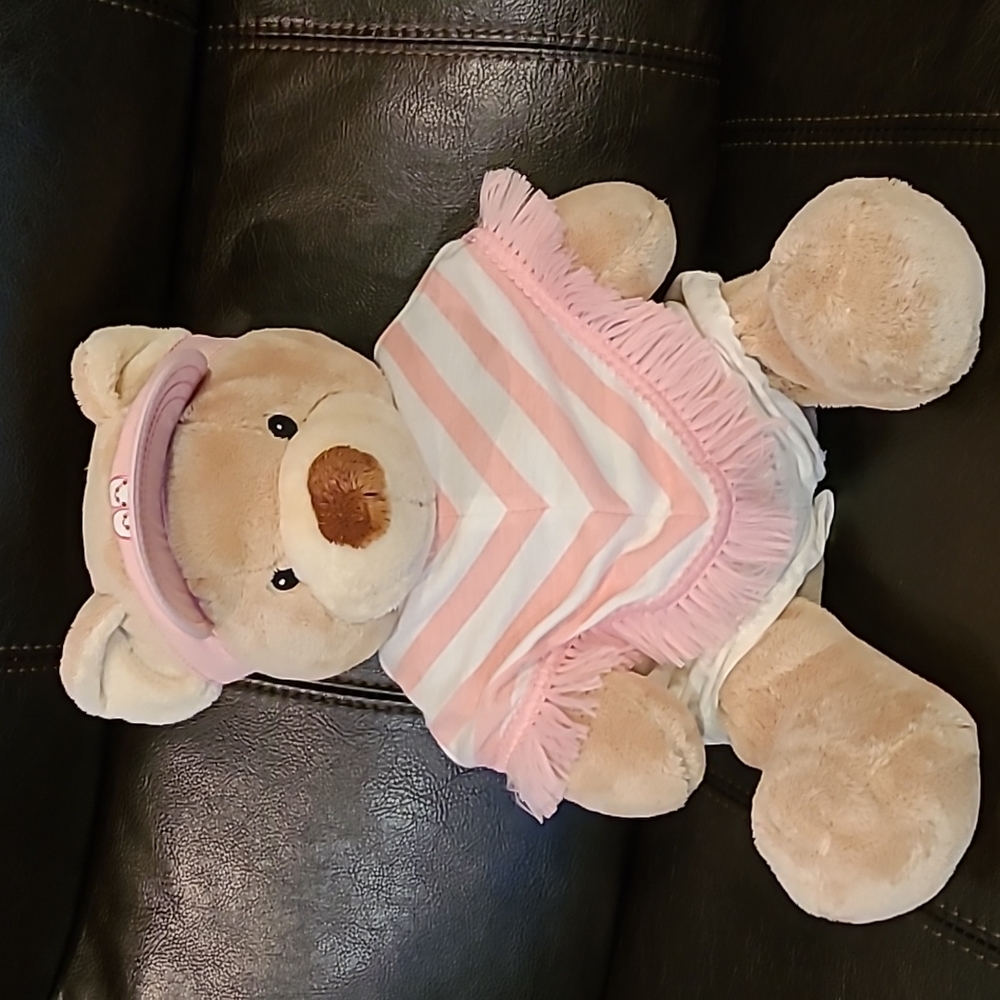 Build-a-Bear tan Teddy in shorts and a poncho with visor